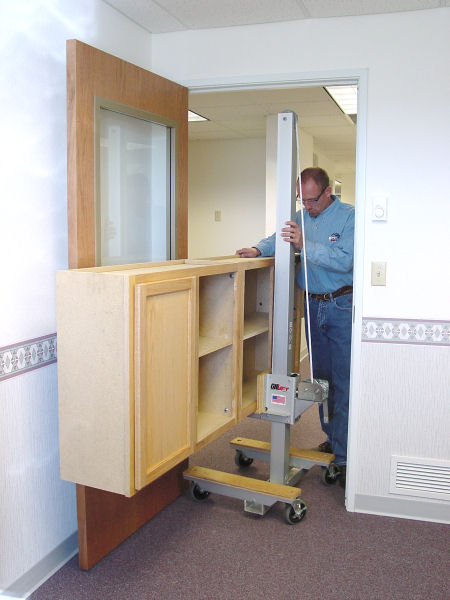 Cabinet lift fits though doorway to kitchen installation